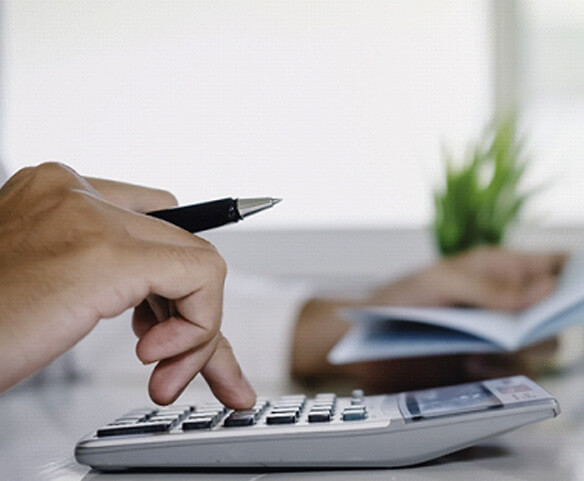 man using a calculator