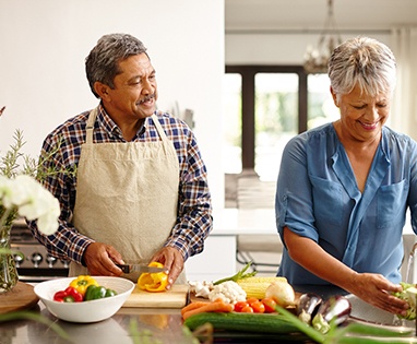 Man and woman cooking in the kitchen