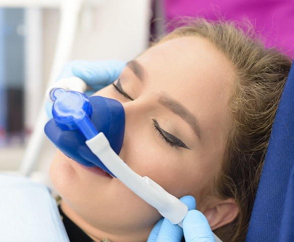 Patient with nitrous oxide sedation dentistry mask